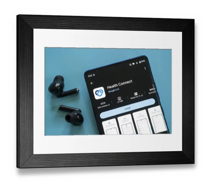 Framed Print : Smartphone displaying Health Connect app with black earbuds on a blue background Framed Print : Smartphone displaying Health Connect app with black earbuds on a blue background