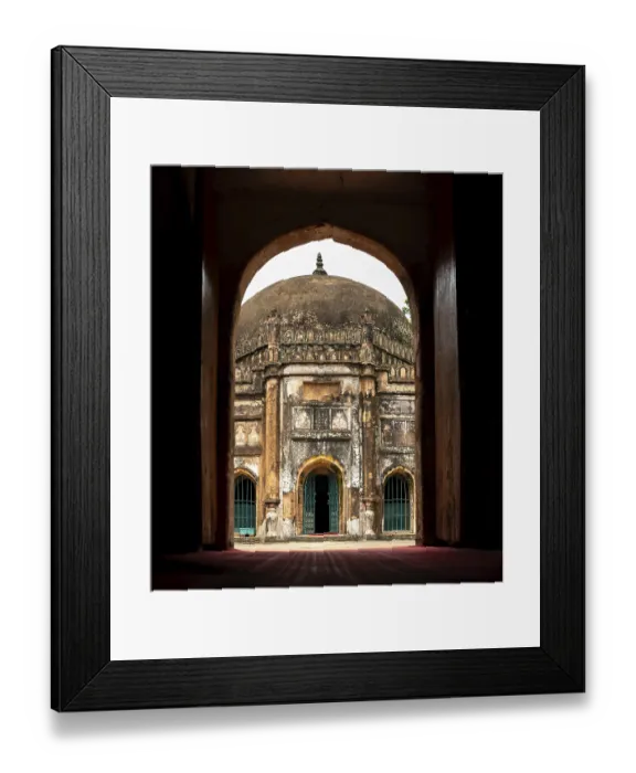 Framed Print : A view through an arched doorway revealing a historic Sheikh Mahmud Shah Masjid