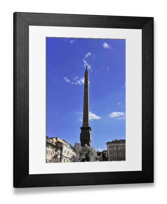 Framed Print : A tall obelisk rising against the clear blue sky