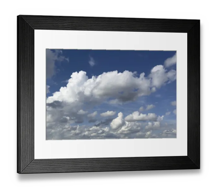 Framed Print : White clouds cumulus heap clouds in front of blue sky
