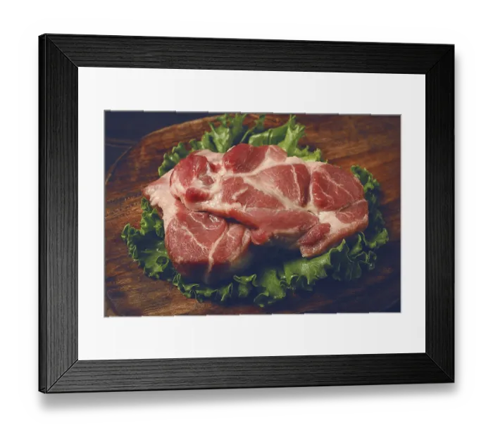Framed Print : Raw pork steak, two pieces, on a wooden background