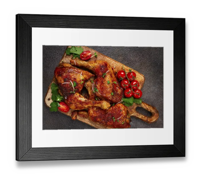 Framed Print : Grilled fried chicken legs, served with fresh cherry tomatoes