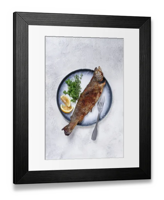 Framed Print : Fried rainbow trout, with herbs and citrus fruits
