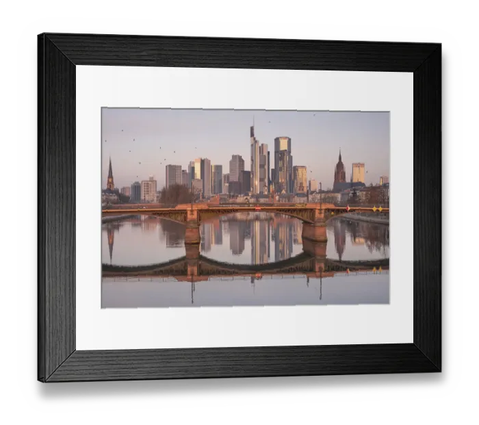 Framed Print : The Frankfurt bank skyline is reflected in the Main River in the morning
