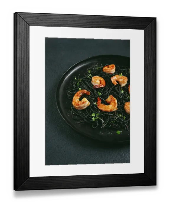 Framed Print : Black spaghetti with shrimp, on a black plate Framed Print : Black spaghetti with shrimp, on a black plate