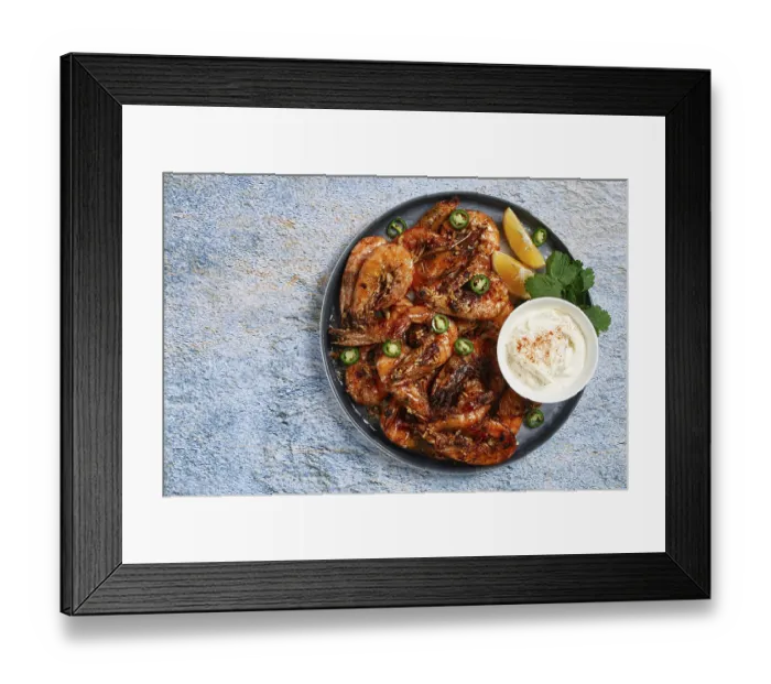 Framed Print : Grilled shrimps served with hot sauce and slices of fresh lemon