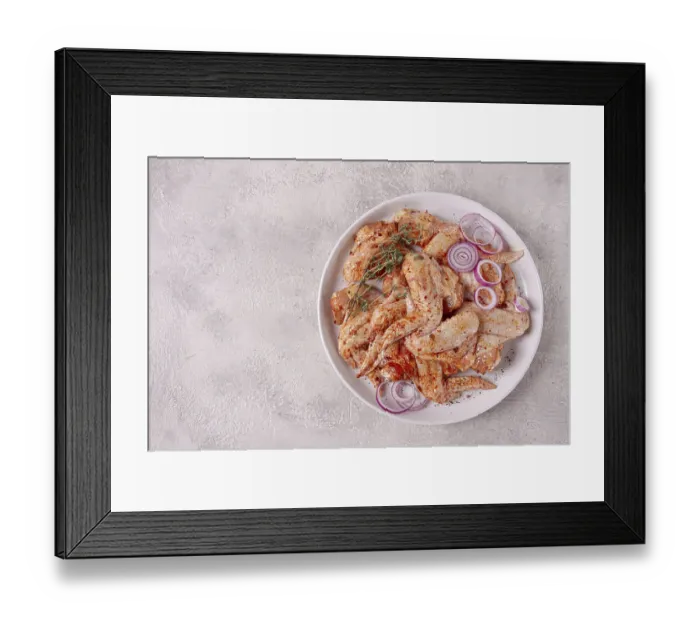Framed Print : Raw chicken wings, marinated with spices