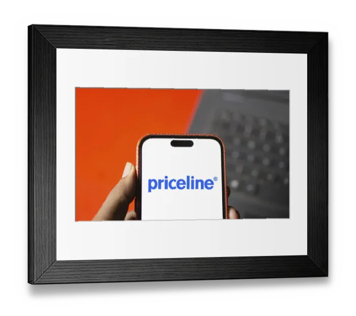 Framed Print : priceline logo is displayed on smartphone