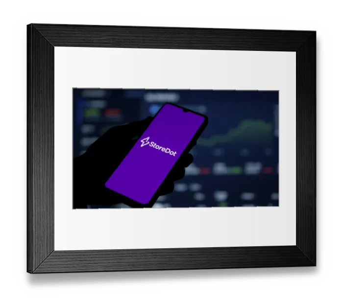 Framed Print : storedot logo is displayed on smartphone
