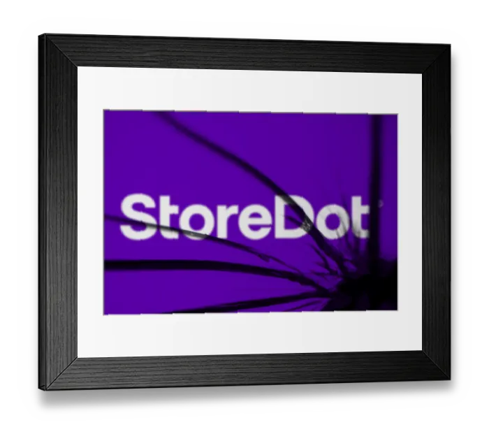 Framed Print : storedot logo is visible on the broken glass