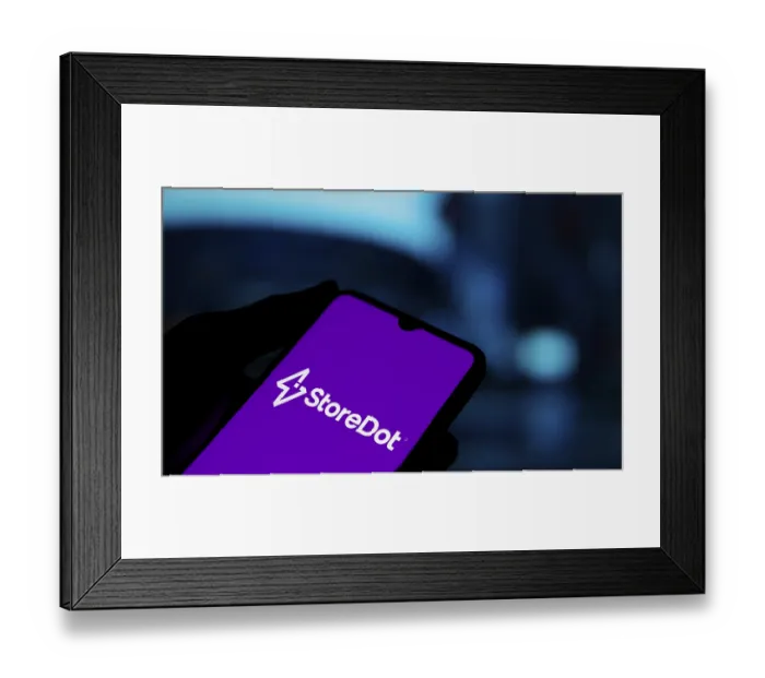 Framed Print : storedot logo is displayed on smartphone Framed Print : storedot logo is displayed on smartphone