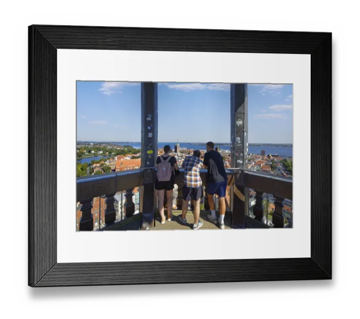 Framed Print : Visitors look out over the city