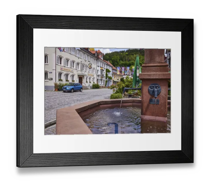 Framed Print : Town fountain, historic buildings
