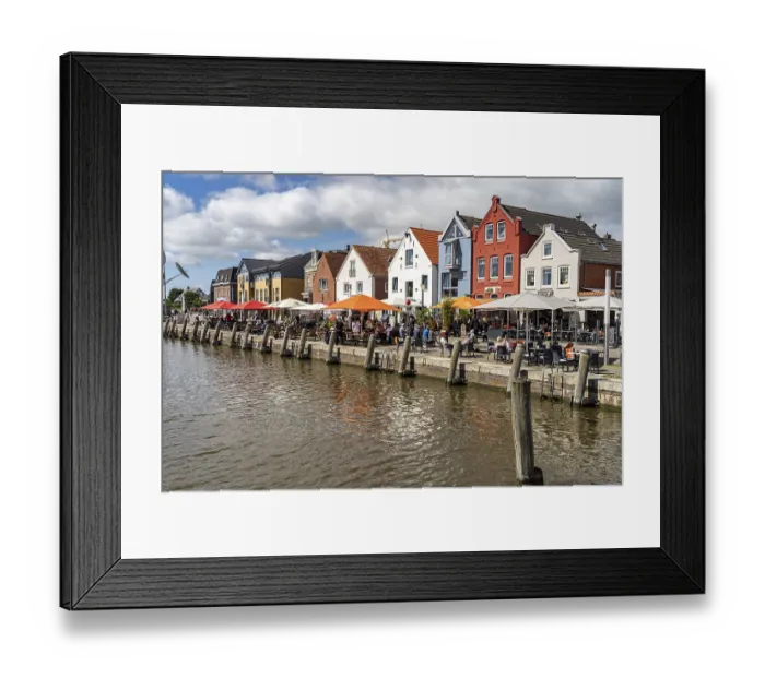 Framed Print : Gastronomy at the inland harbour and old town in Husum Framed Print : Gastronomy at the inland harbour and old town in Husum