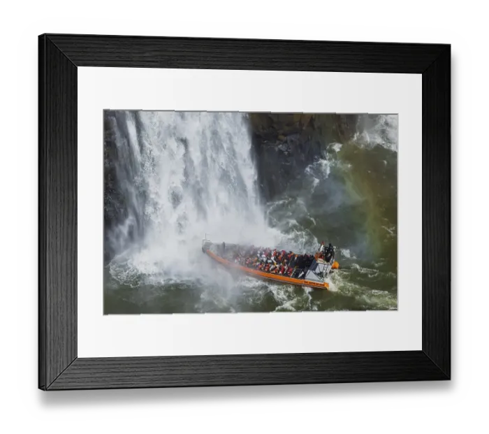 Framed Print : Tourists in a boat, at the foot of the Iguazu Falls Framed Print : Tourists in a boat, at the foot of the Iguazu Falls