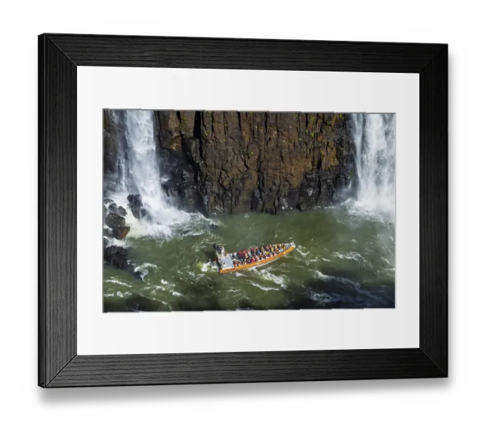 Framed Print : Tourists in a boat, at the foot of the Iguazu Falls Framed Print : Tourists in a boat, at the foot of the Iguazu Falls