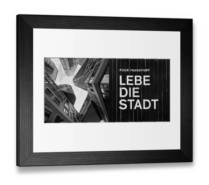 Framed Print : Frog's-eye view of skyscrapers in the banking district and construction fence with the inscription Lebe die Stadt Framed Print : Frog's-eye view of skyscrapers in the banking district and construction fence with the inscription Lebe die Stadt