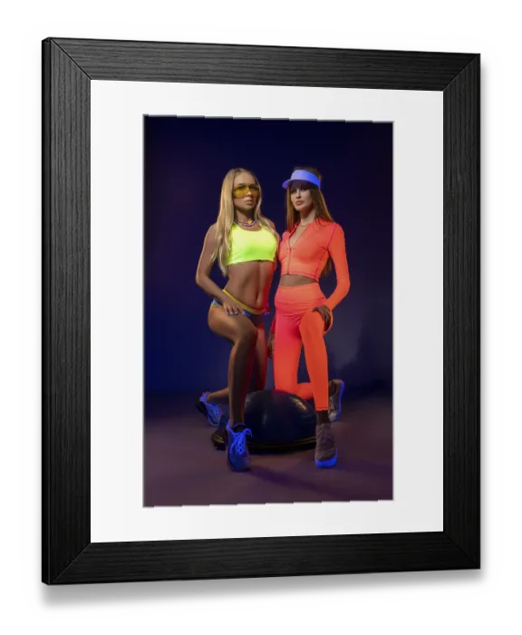 Framed Print : Full body of confident young female athletes with long blond Framed Print : Full body of confident young female athletes with long blond