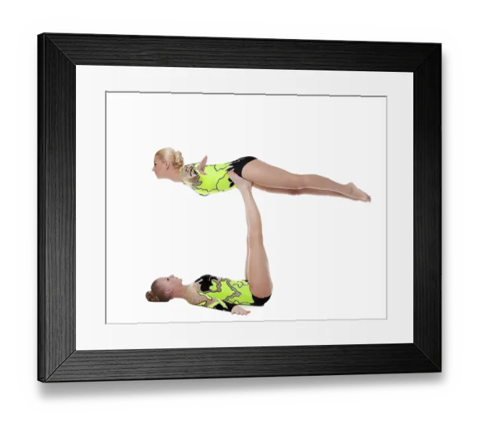 Framed Print : Two young woman show high gymnastic skill exercise isolated