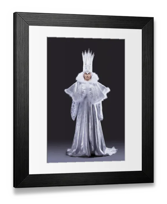Framed Print : Portrait of serious girl stand in ice queen carnival costume