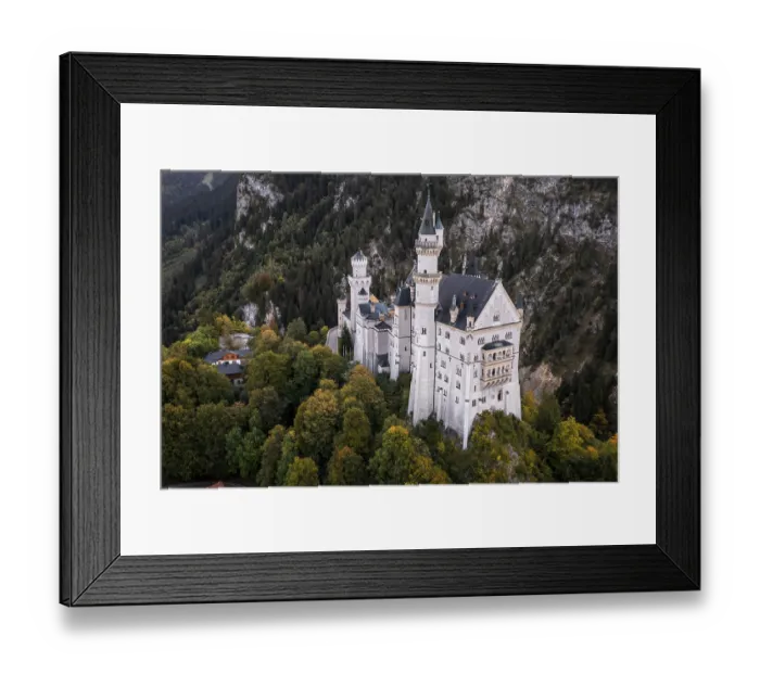 Framed Print : A majestic castle with towers in the middle of the forest