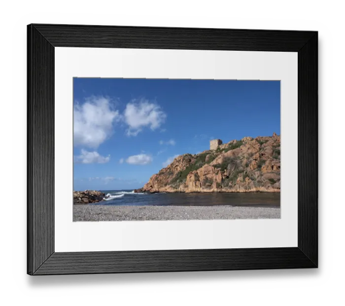 Framed Print : View from the beach of the red rocks and the Genoese Tower (Tour Genoise de Porto)