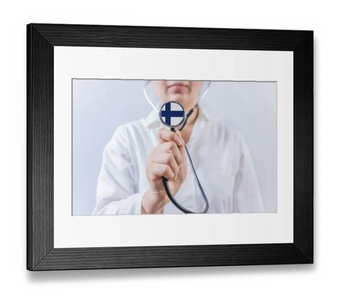 Framed Print : Female doctor holding stethoscope with Finland flag Framed Print : Female doctor holding stethoscope with Finland flag