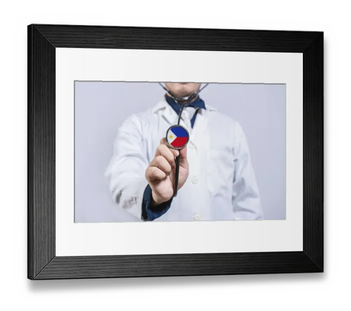 Framed Print : Doctor hands holding stethoscope with Philippines flag