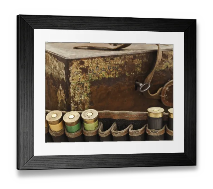 Framed Print : Some Old Cartridge For Hunting Rifle Against Vintage Rusty Chest