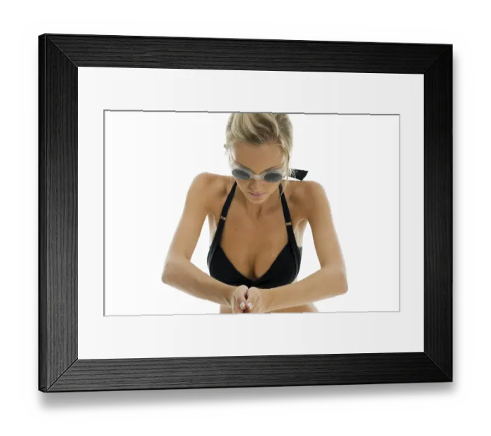 Framed Print : Young beautiful sportswoman in swimming costume with swimming goggles