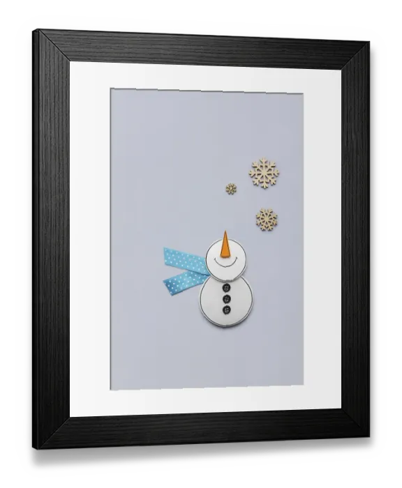 Framed Print : Creative photo of a paper snowman on a grey background