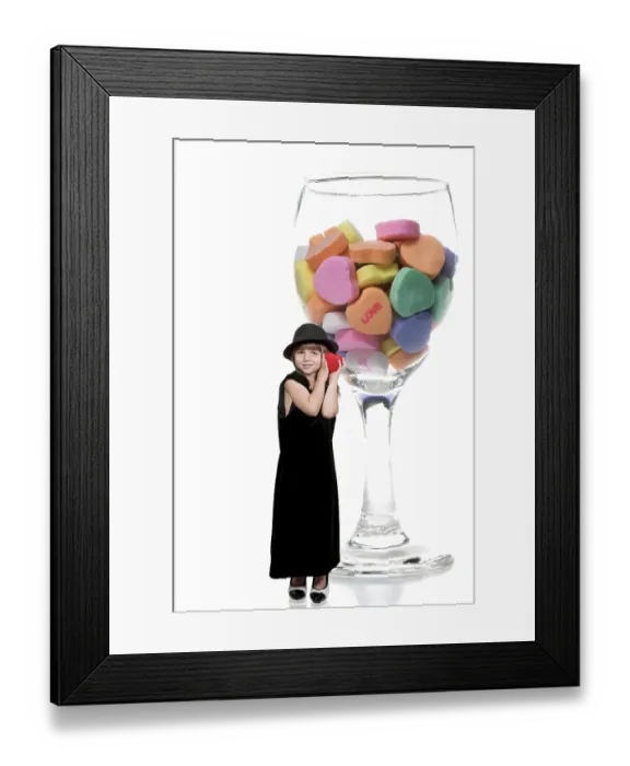 Framed Print : Beautiful little girl holding a Valentines Day heart