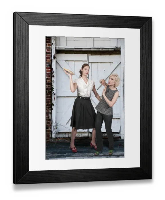 Framed Print : Beautiful woman having a friendly pie fight