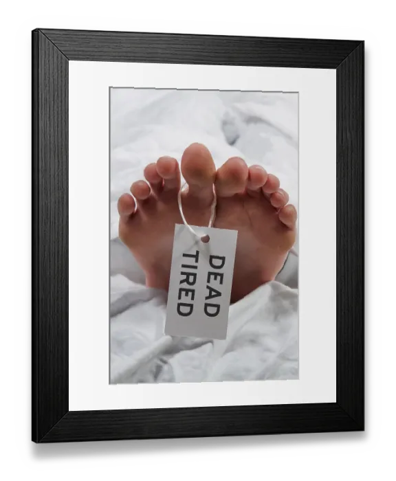 Framed Print : Practical joke toe tag on a tired asleep woman