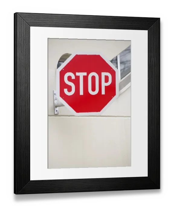 Framed Print : A brightly coloured stop sign on the facade of a building A brightly coloured stop sign on the fa Framed Print : A brightly coloured stop sign on the facade of a building A brightly coloured stop sign on the fa
