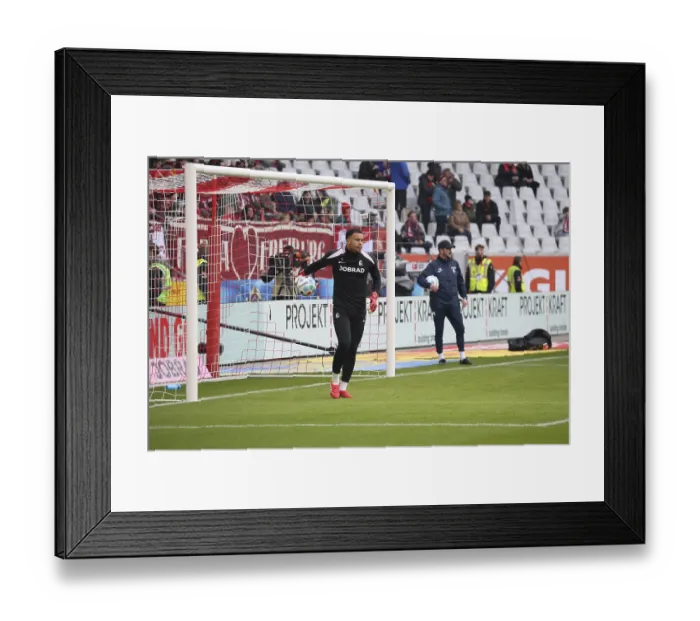 Framed Print : Goalkeeper Noah Atubolu (SC Freiburg) at the match of the 1st FBL: 24-25: 21st Sptg