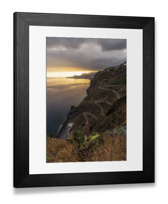 Framed Print : Winding road at Mirador de Cristo Rei at sunset in Funchal in summer