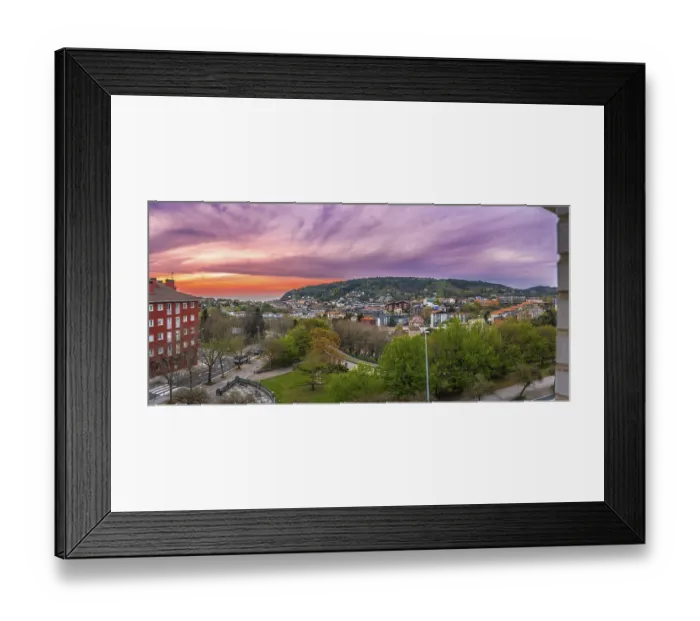 Framed Print : Panoramic sunset in Donostia San Sebastian from a high neighborhood and the sea in the background