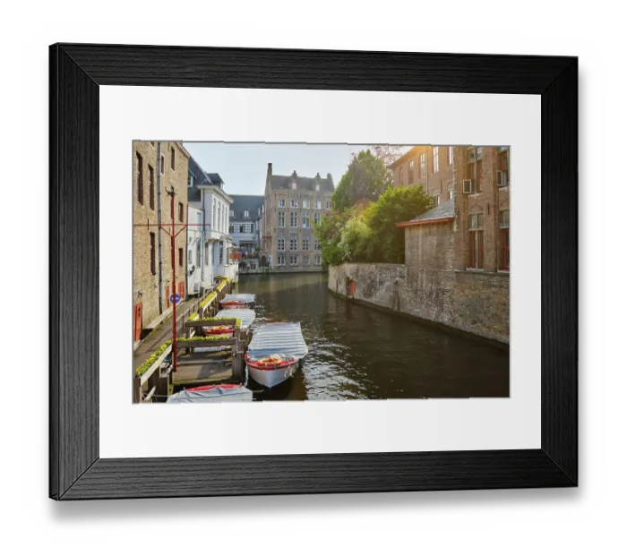 Framed Print : Famous place of Bruges, Rozenhoedkaai old houses along canal with tree and boats