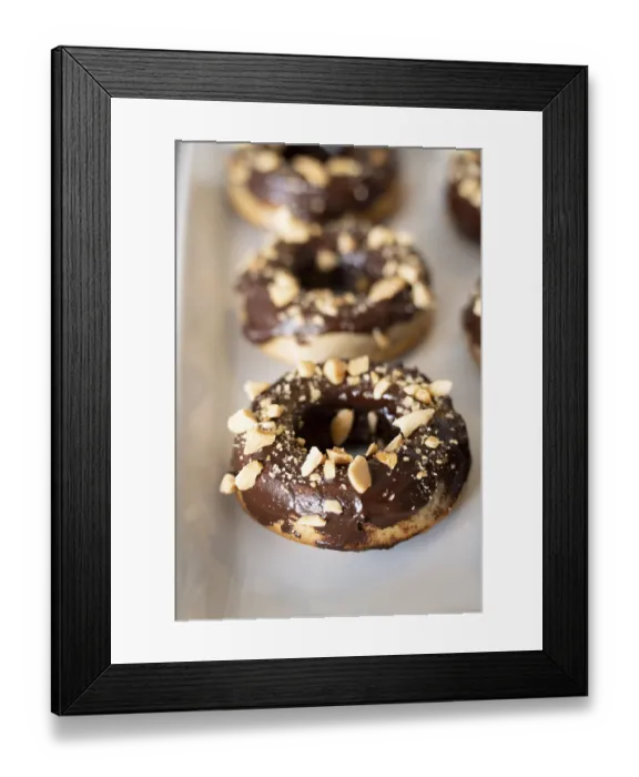 Framed Print : Healthy gluten-free donuts covered in chocolate and almonds