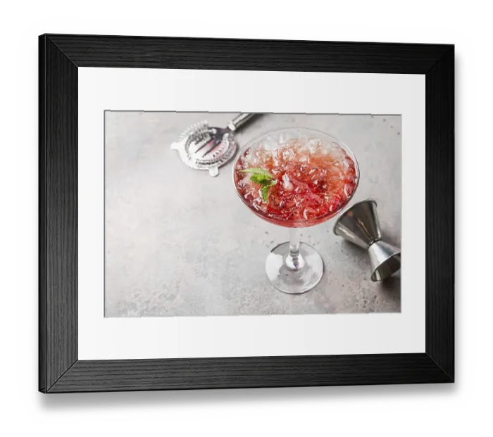 Framed Print : Fresh red margarita cocktail with ice and mint over gray background
