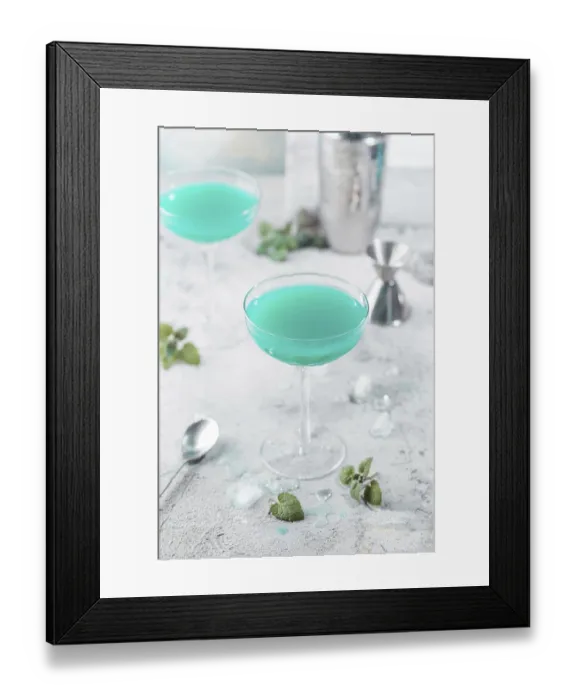 Framed Print : Colorful summer cocktail Blue Hawaii or iced blue lagoon alcohol drink with mint on light stone background