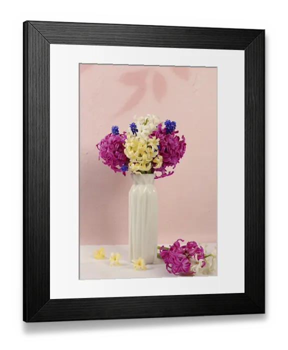 Framed Print : Beautiful still life of different varieties of hyacinths and muscari in a vase on an elegant kitchen background Framed Print : Beautiful still life of different varieties of hyacinths and muscari in a vase on an elegant kitchen background