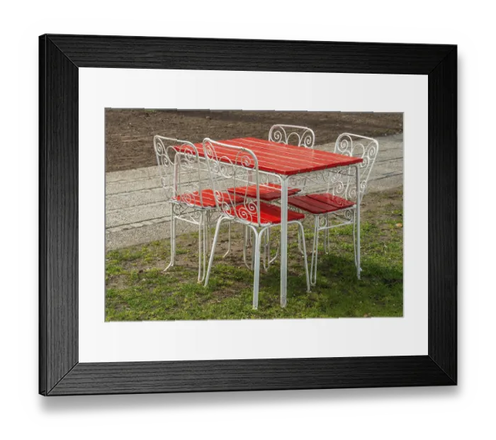 Framed Print : Garden furniture at a cafe prepared for the opening in the spring in Ystad