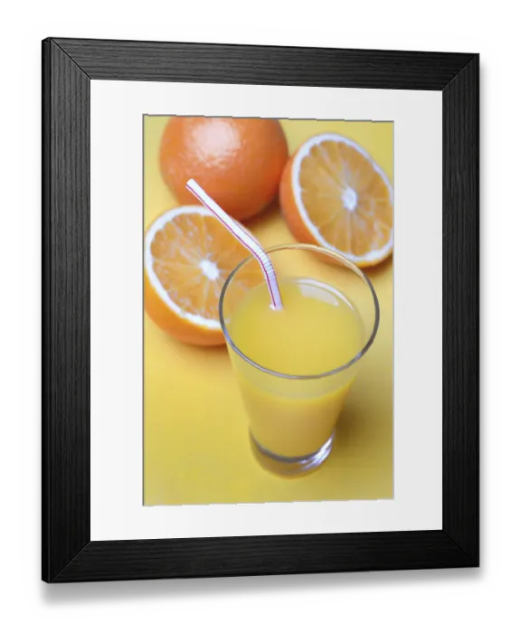Framed Print : Orange juice in glass and oranges