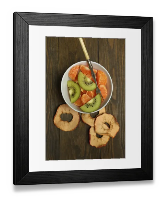 Framed Print : Clementine pieces and kiwi slices in peel
