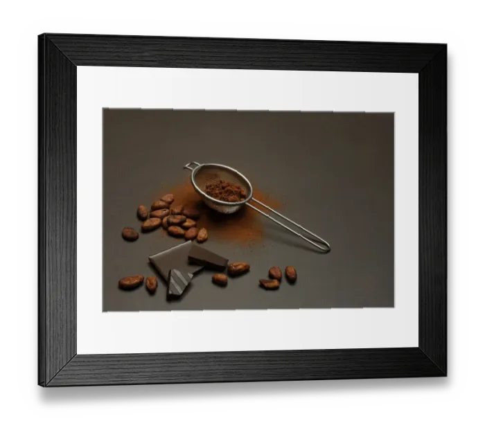 Framed Print : Kitchen sieve with cocoa powder and chocolate