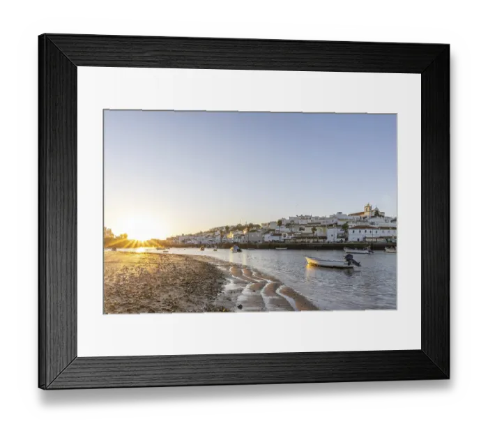Framed Print : Sunrise with view over a beach and harbour basin at low tide