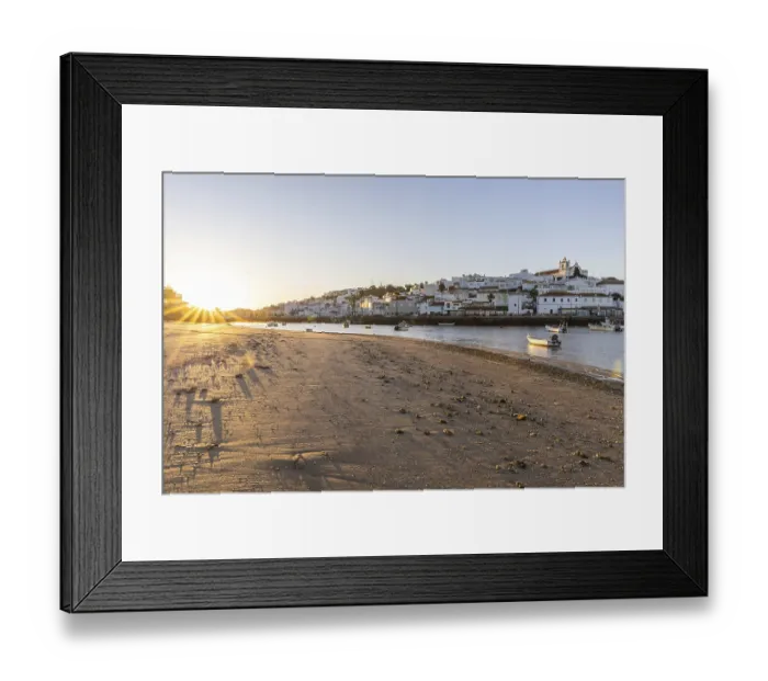 Framed Print : Sunrise with view over a beach and harbour basin at low tide