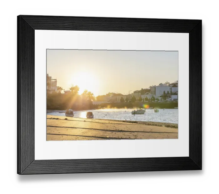 Framed Print : Sunrise with view over a beach and harbour basin at low tide